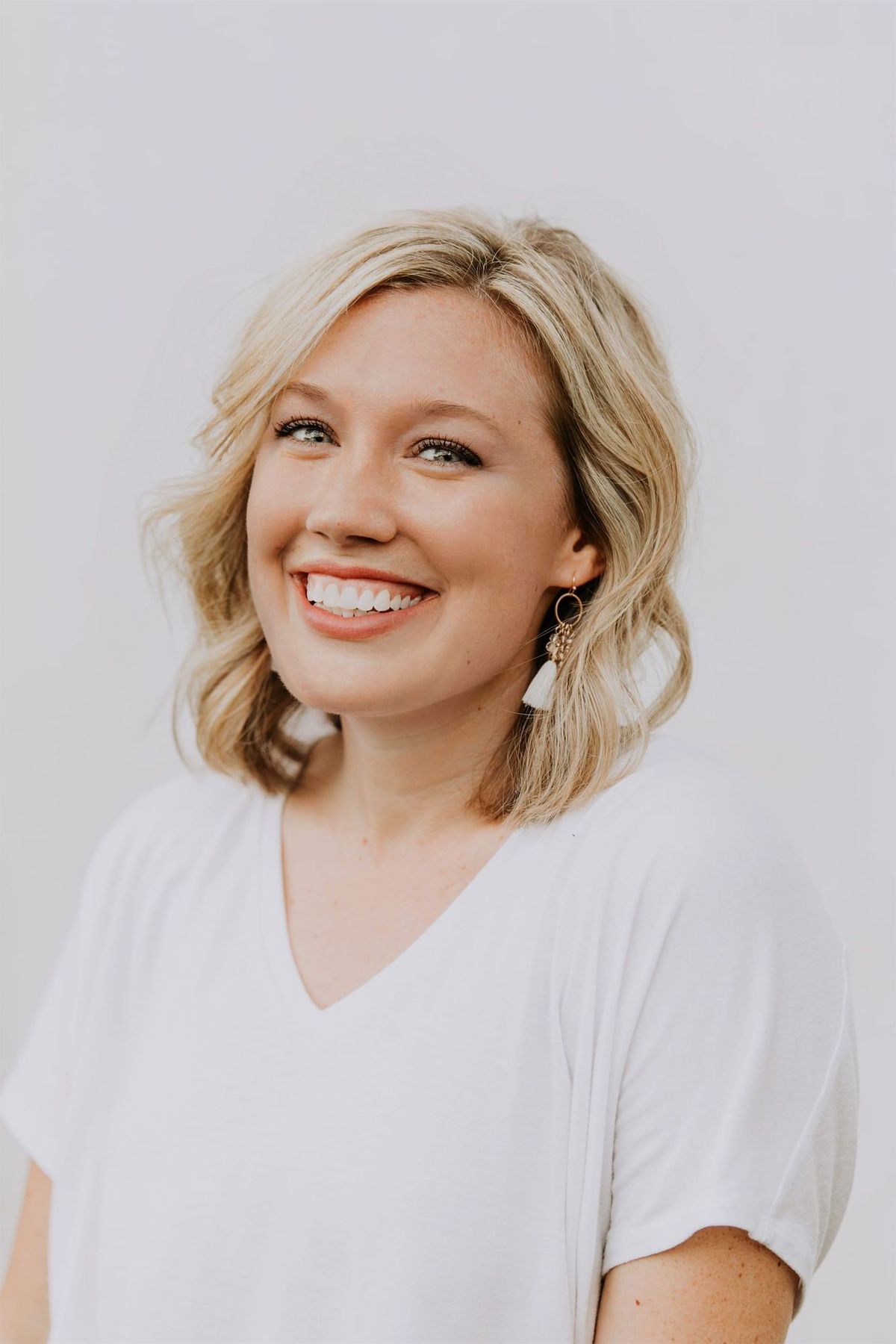 Christine Simpson Wessa in a white shirt headshot version two