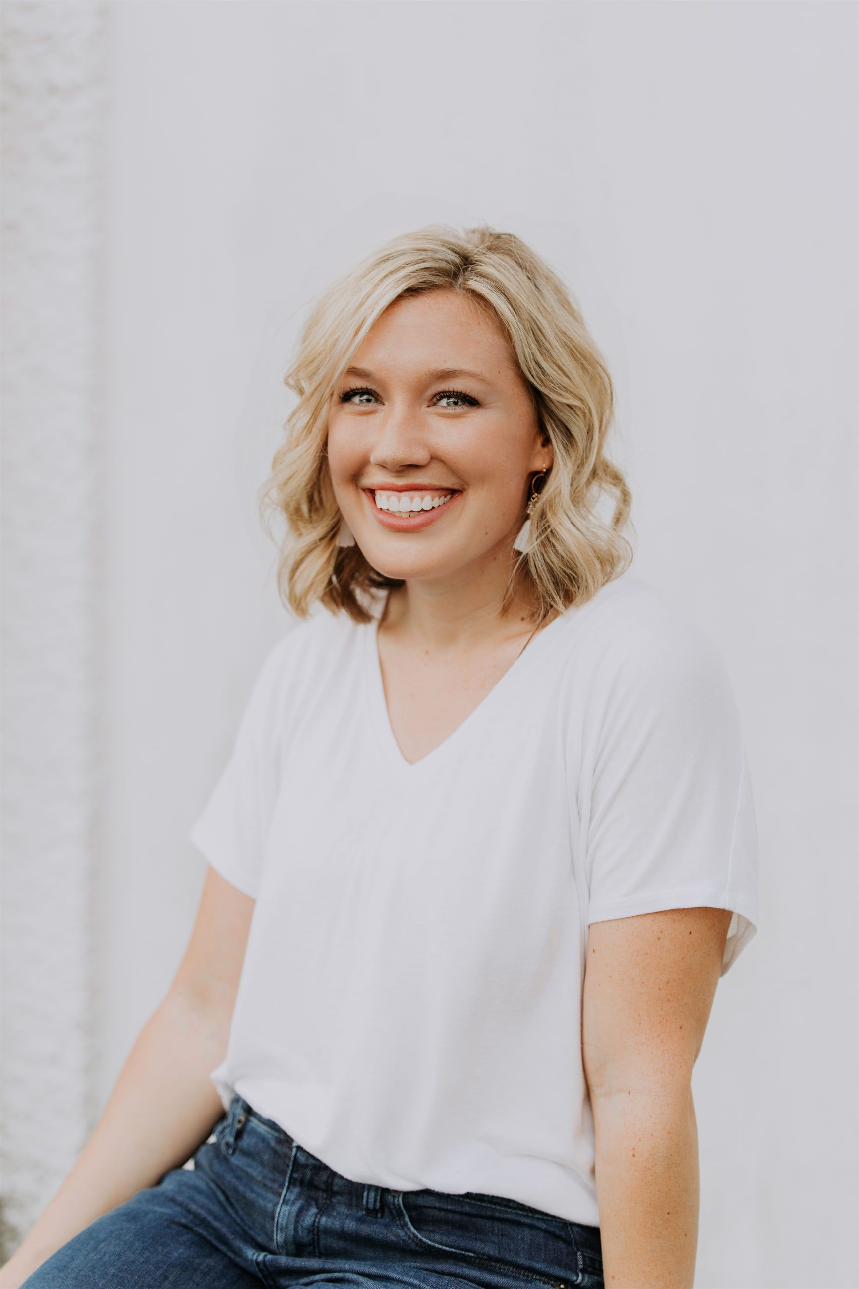 Christine Simpson Wessa in a white shirt headshot version one